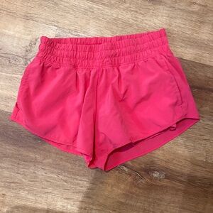 xs offline by aerie hot pink shorts with large pockets and spandex under shorts